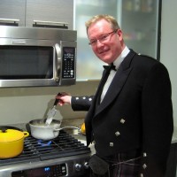 David mixes the neeps.