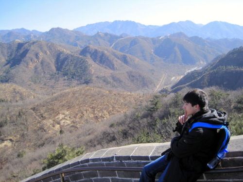 Preparing to slide down the Great Wall banister! 