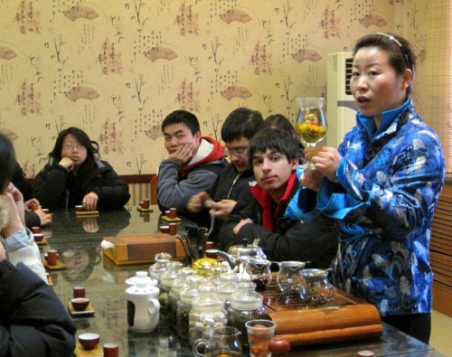Julio listening intently during a tea ceremony in Beijing.