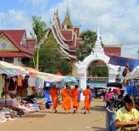 Around Vientiane, led by Orange-Clad Monks!