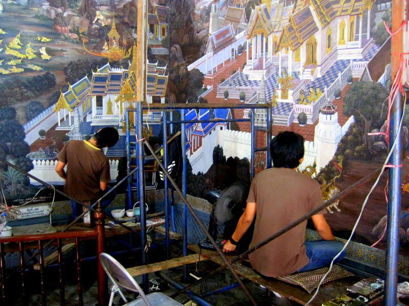 Restoring the murals at the Grand Palace.