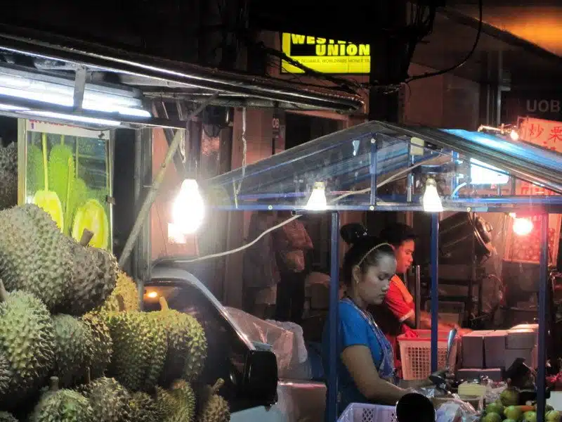 Fruit for sale at night in Bangkok.