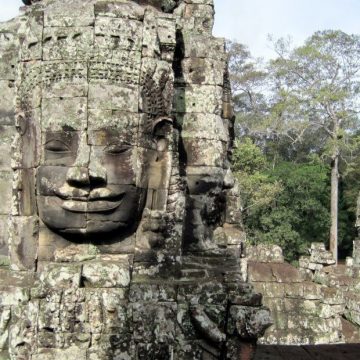 A carved face in Bayon Temple in Angkor Wat, Cambodia.
