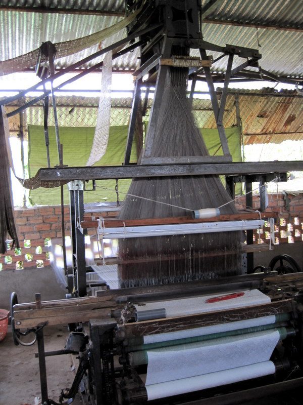 A silk-weaving machine in Vietnam.