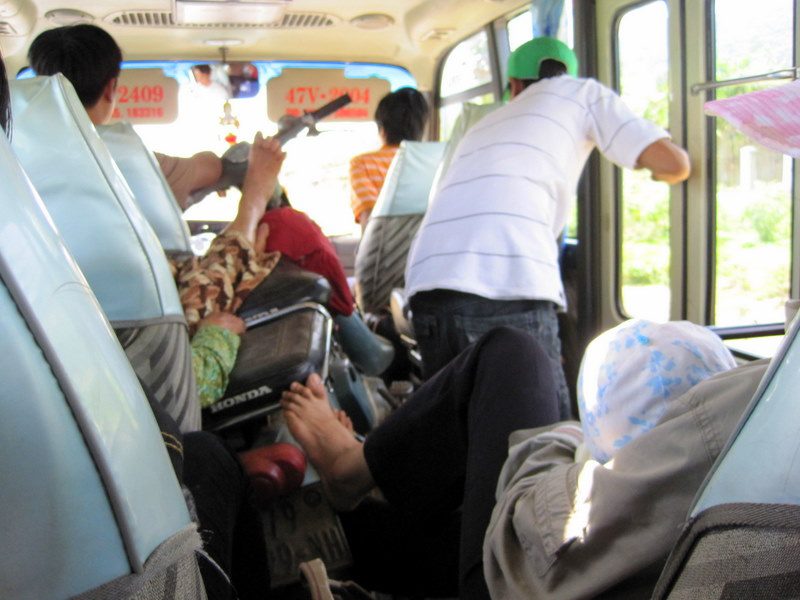 The crowded minibus in central Vietnam.