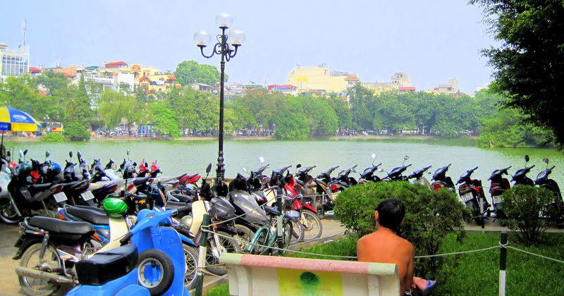 Motorbikes along the lake in Hanoi.