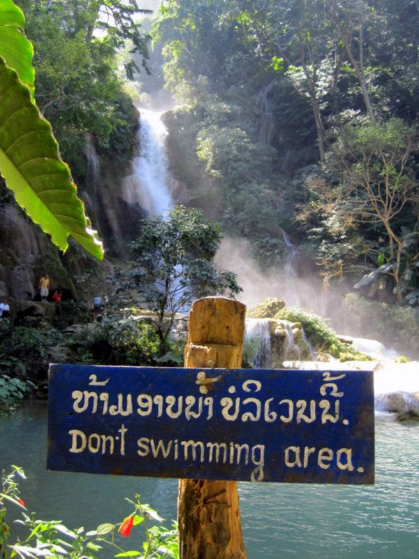 A sign for a waterfall near Luang Prabang.