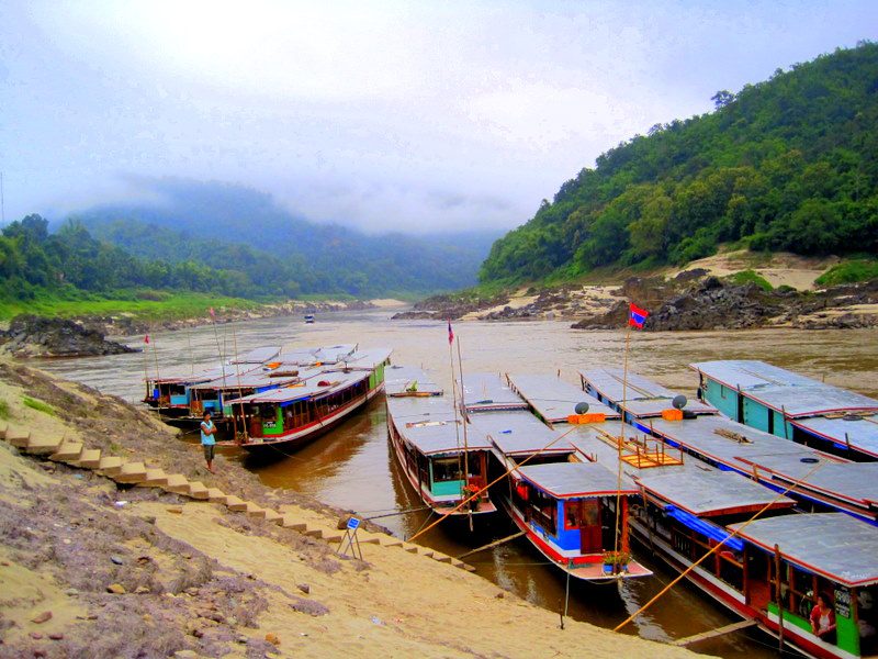Docked boats on the Mekong River in Laos.