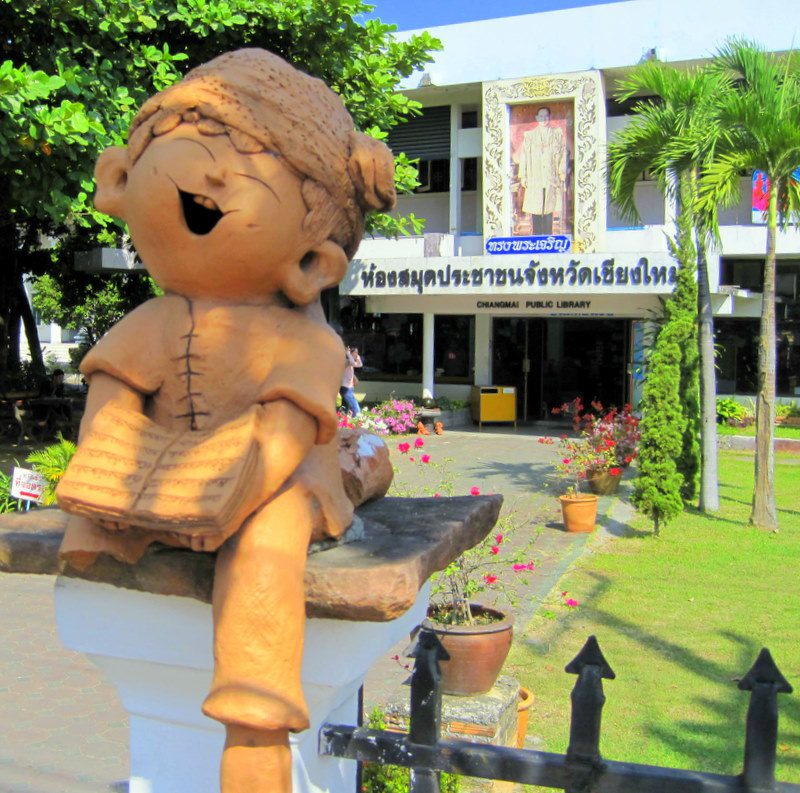 A statue outside the Chiang Mai library.