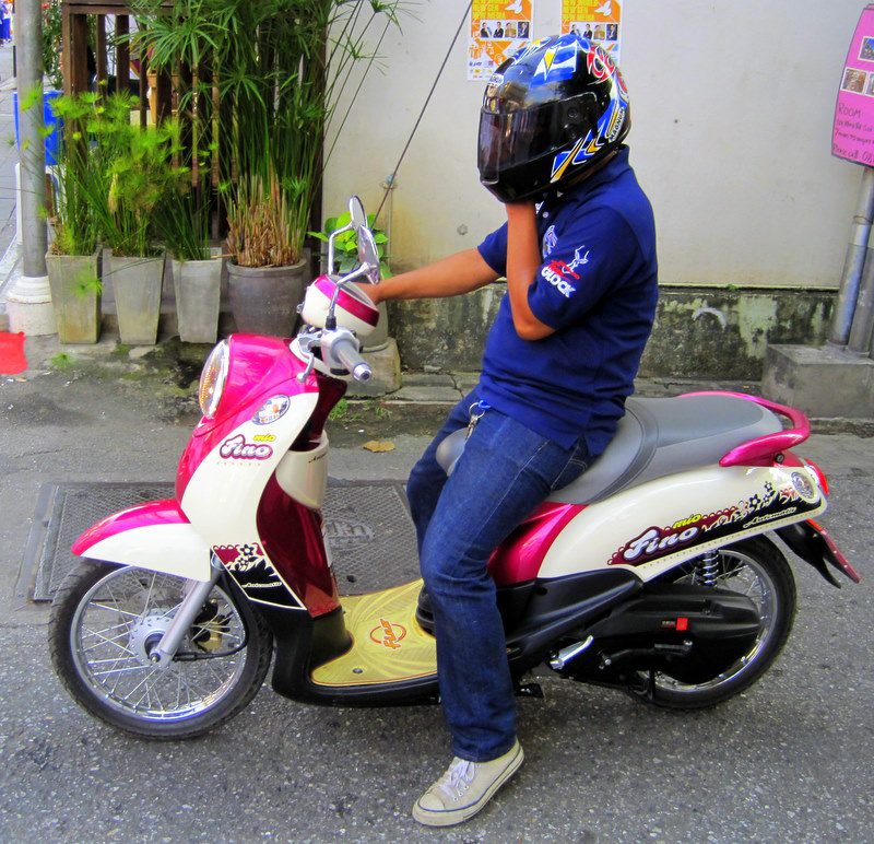 Hand in motorcycle helmet...