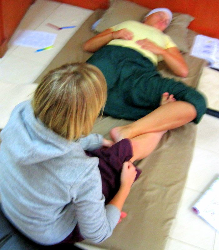 Leg positioning in Thai Massage.