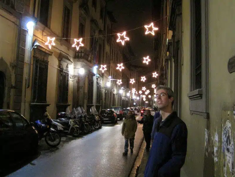 My brother looking at the holiday lights.