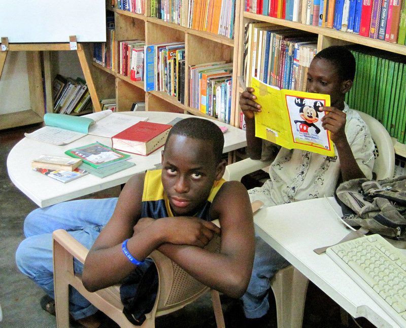 Ghanaian students reading in the library.