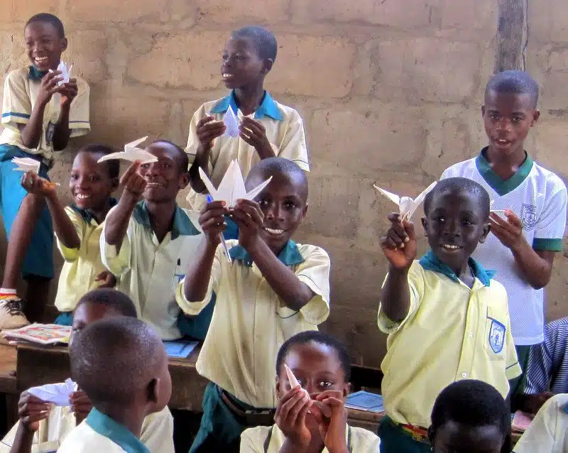 Doing origami in Ghana.