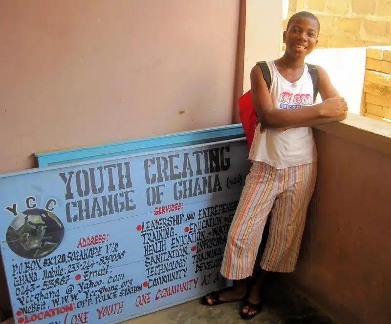 Pamela with the Youth Creating Change sign.