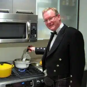 David mixes the neeps.