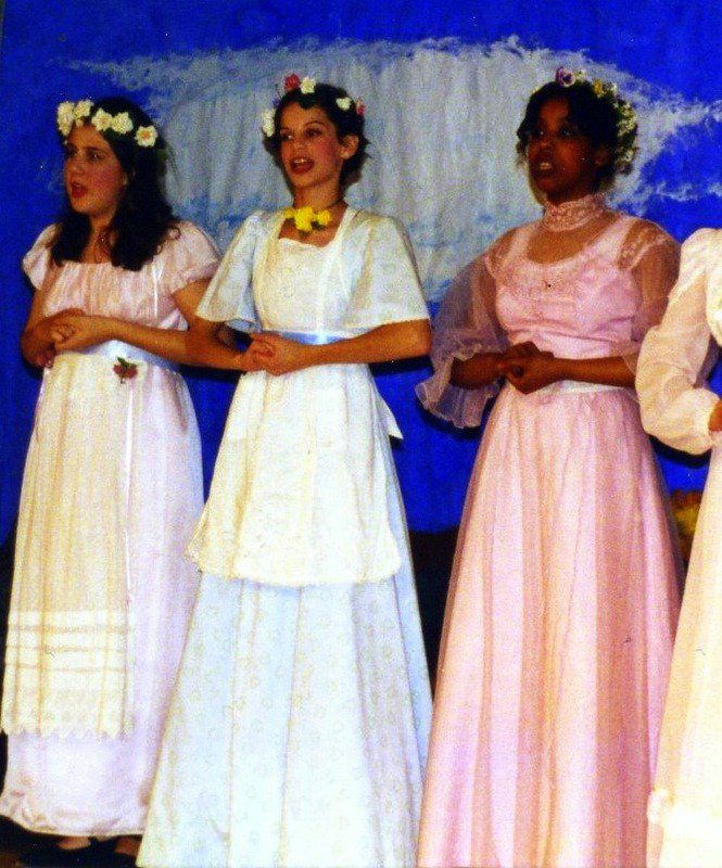 In the middle, singing in my 8th grade play!