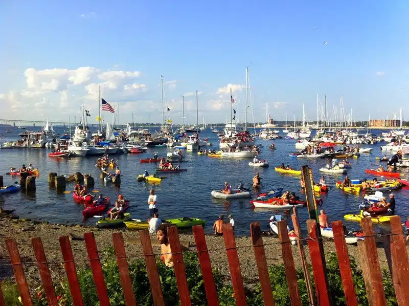 Boats lined the water outside the Newport Folk Festival to listen.