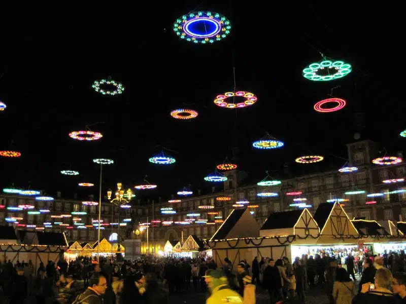 The lights in the Plaza Mayor look like benevolent UFOs above the gift stalls!