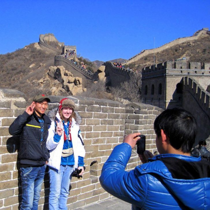 Strangers taking photos with Celebrity Candace at the Great Wall!
