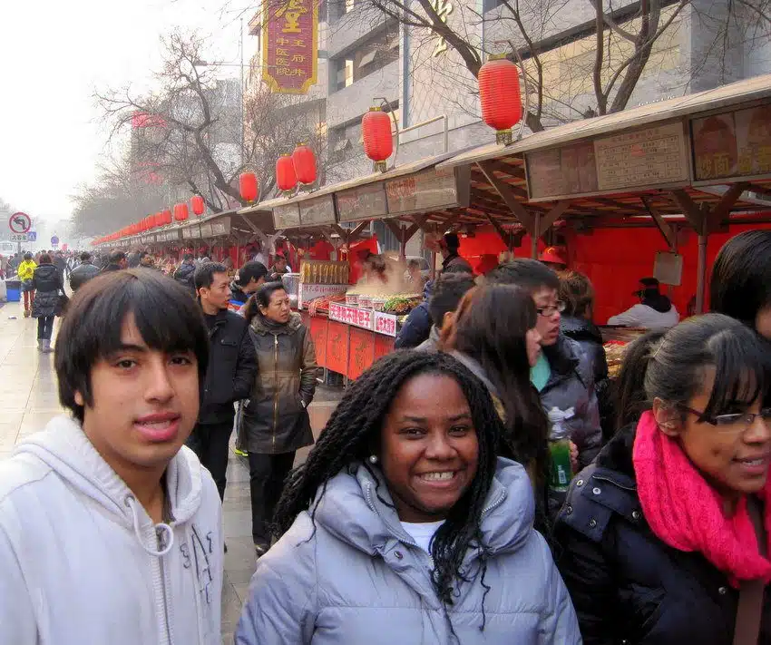 Daniel and a Boston classmate at Beijing's Night Market.