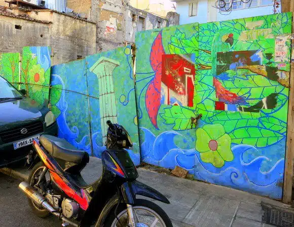 Is this pretty wall in Athens the result of paying graffiti artists to do legal public art?