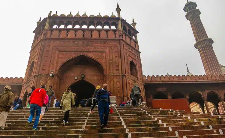 Walking up the stairs to majestic Jama Masjid mosque. 