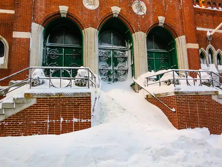Church stairs in Boston completely covered in snow