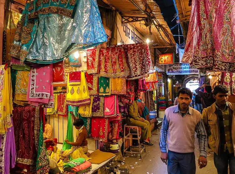An alley in Jaipur selling stunningly colored clothing. 