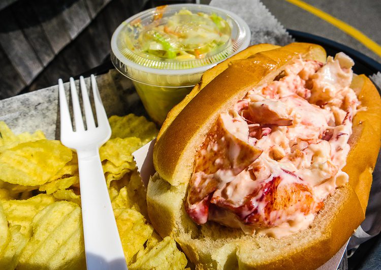 Lobster rolls, chips, coleslaw, and sun. What more could you want? 