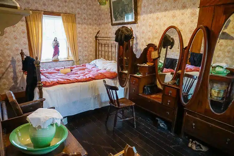 A bedroom in a house in Bunratty Folk Park. 