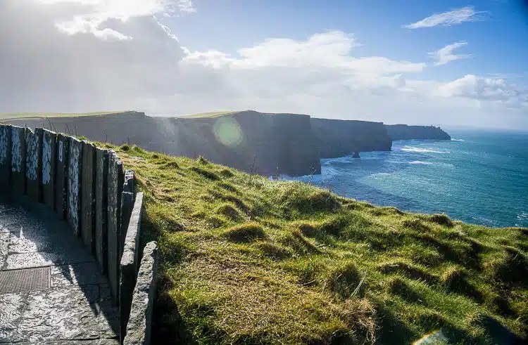 Cliffs of Moher, Ireland: The sweeping lines of the cliffs and railing.