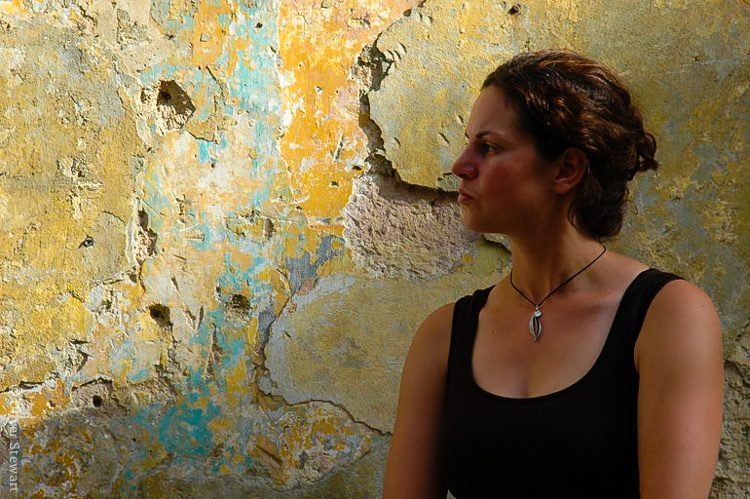 Me looking pensive by a weathered Havana wall.