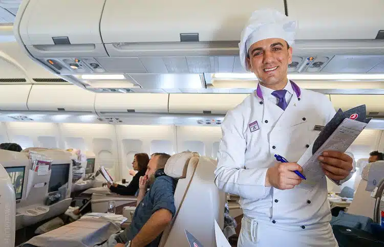 The famous Turkish Airlines on-board chef. See all that Business Class leg room?
