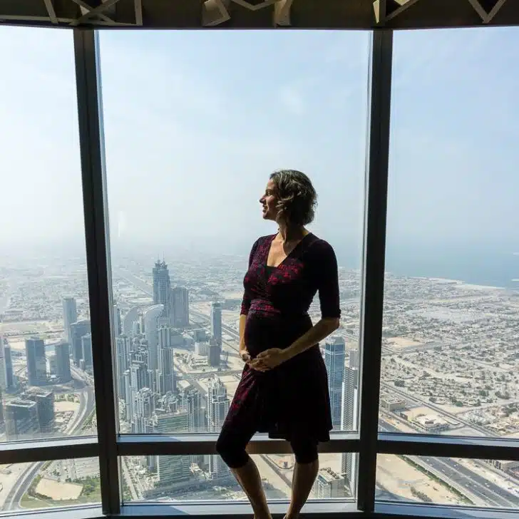 Atop the world's tallest building, the Burj Khalifa in Dubai. This is a non-maternity Perfect Wrap and you can see it still fits a bump.