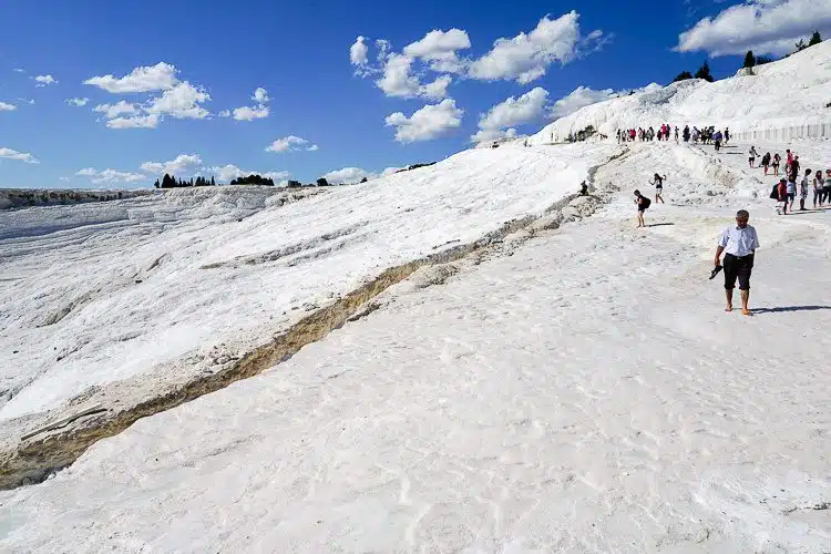 People from all over the world come to climb down Pamukkale.
