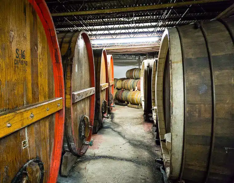 Giant barrels of wine aging at Wagner Vineyards.