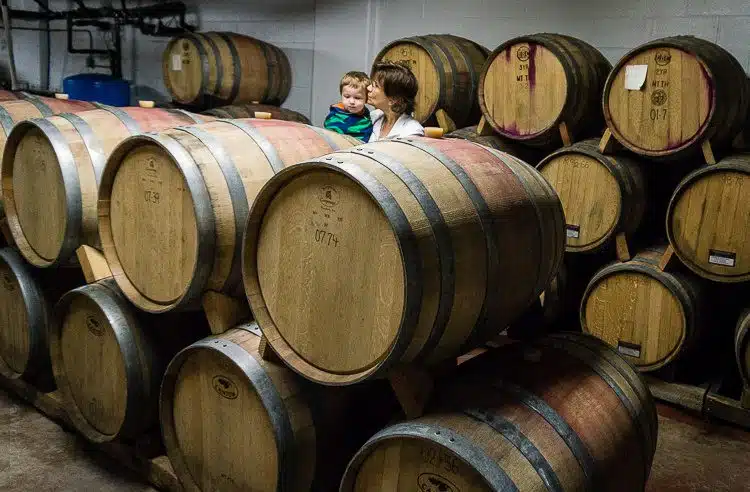 A smooch with Nana in the wine barrels.