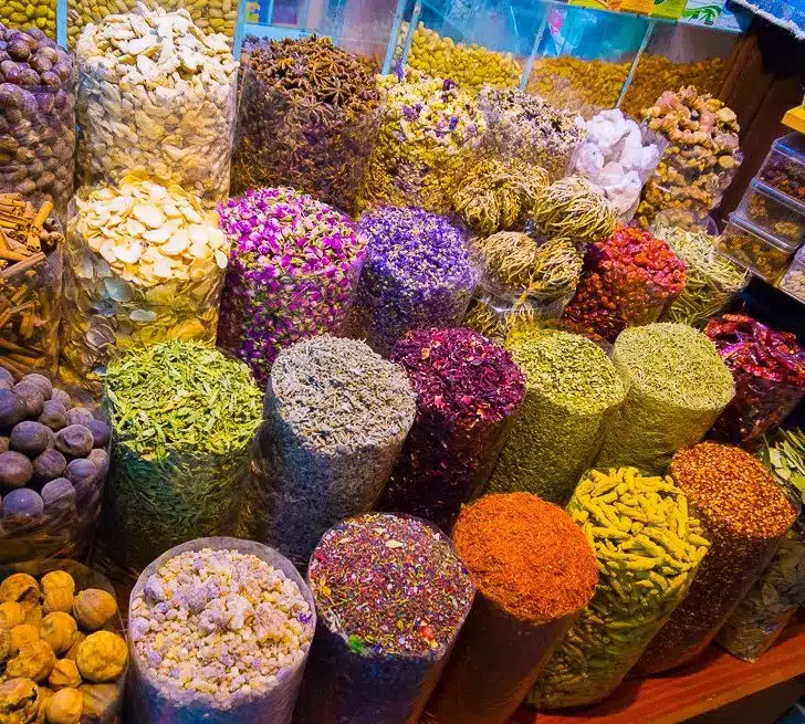 Rainbow colored spices in Dubai's Spice Souk.