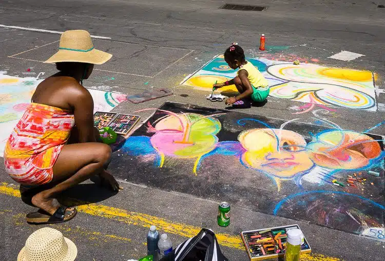 Mother and daughter street painting.