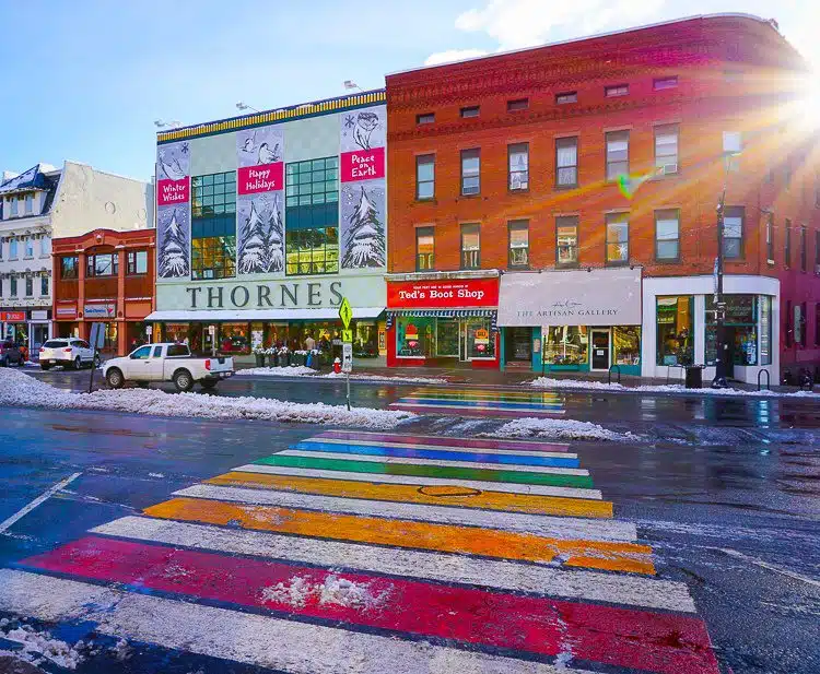 Rainbow crosswalk and sunburst in Northampton, MA for weekend getaways in New England