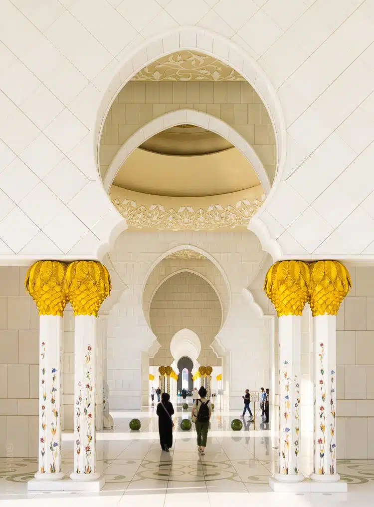 Keyhole doorway shapes! The Sheikh Zayed Grand Mosque in Abu Dhabi, UAE is one of the most beautiful free tourist attractions in the world. Learn tips on visiting this amazing building.
