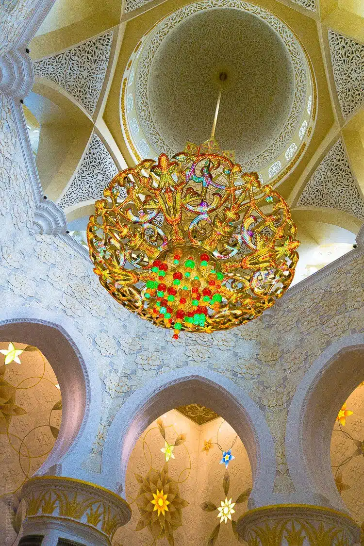 Have you ever seen a chandelier like this? The Sheikh Zayed Grand Mosque in Abu Dhabi, UAE is one of the most beautiful free tourist attractions in the world. Learn tips on visiting this amazing building.