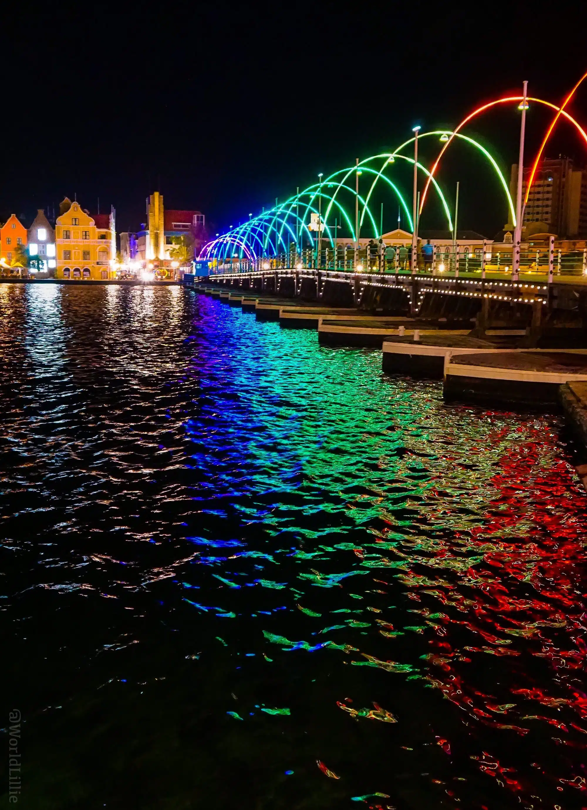 The Queen Emma Floating Bridge in Willemstad, Curacao, is a gorgeous floating rainbow!