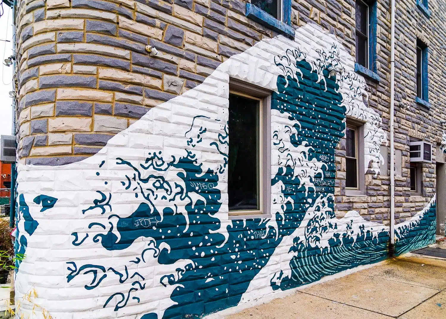This building's wave wall echoes the watery theme.