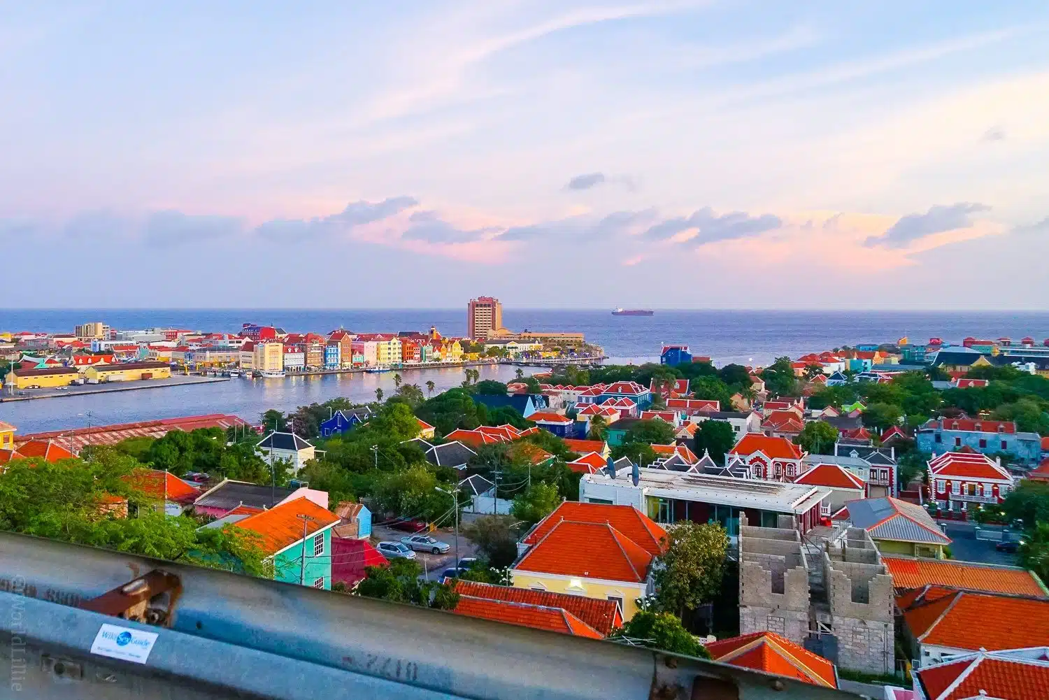 Looking down at Willemstad at sunset from the bridge.