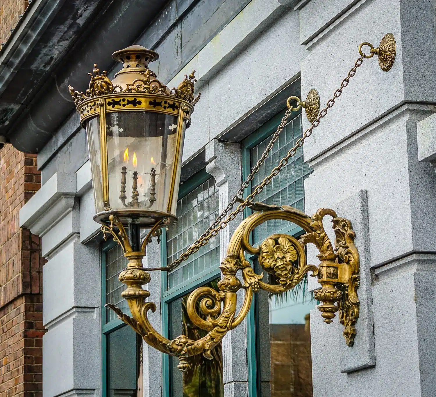 Gold and ornate lamp-holder.