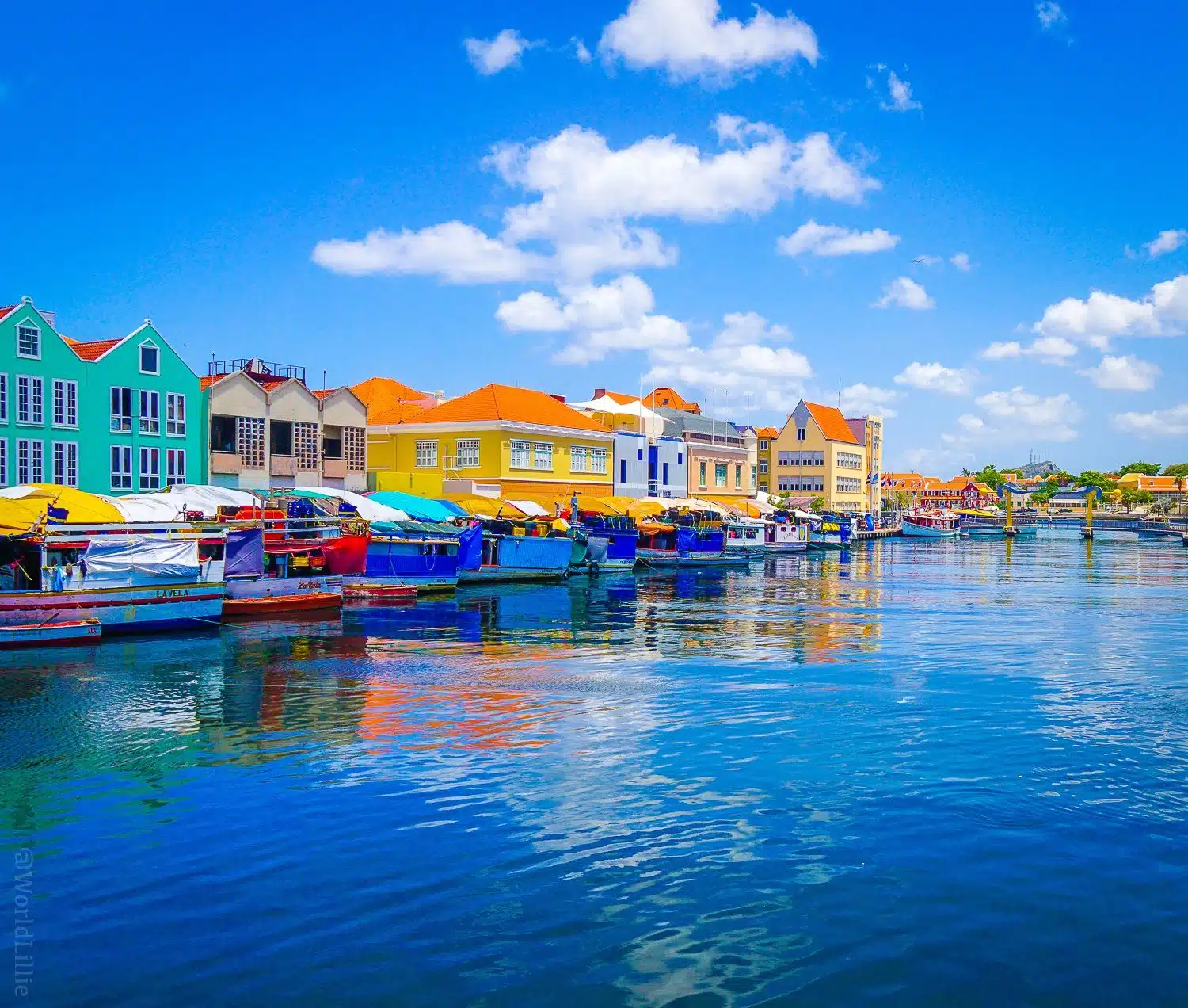 Willemstad, Curacao: Fishermen's boats reflect the water.