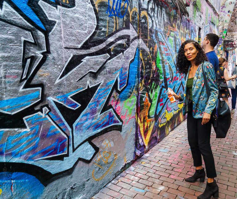 Harmonie getting ready to paint in Graffiti Alley.