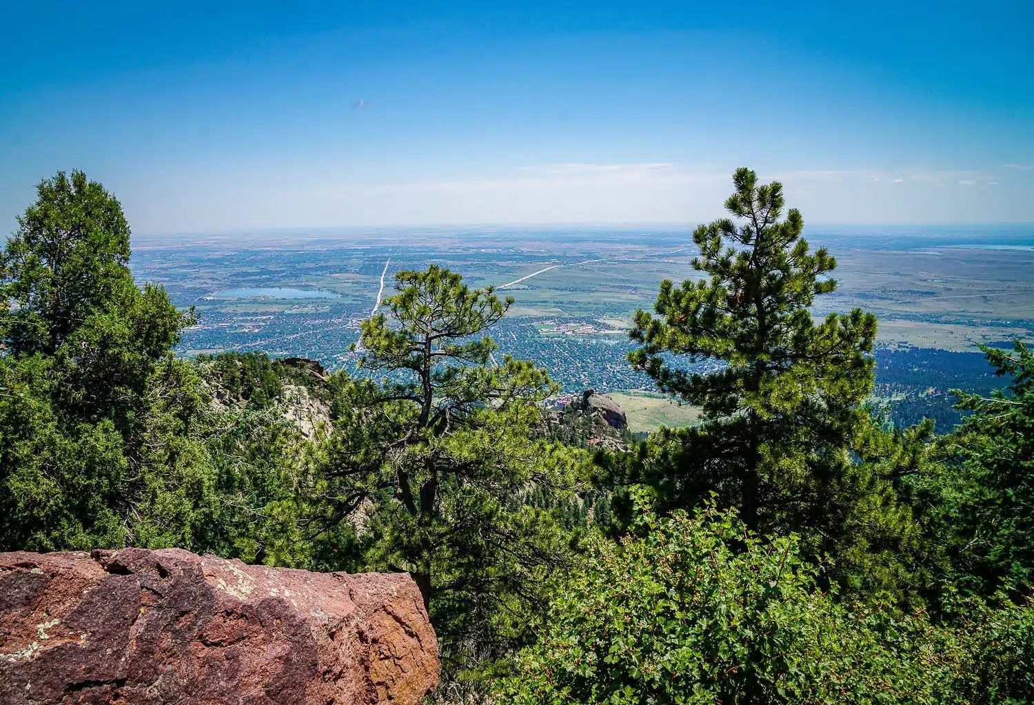 Green mountain summit view of flat Boulder, CO